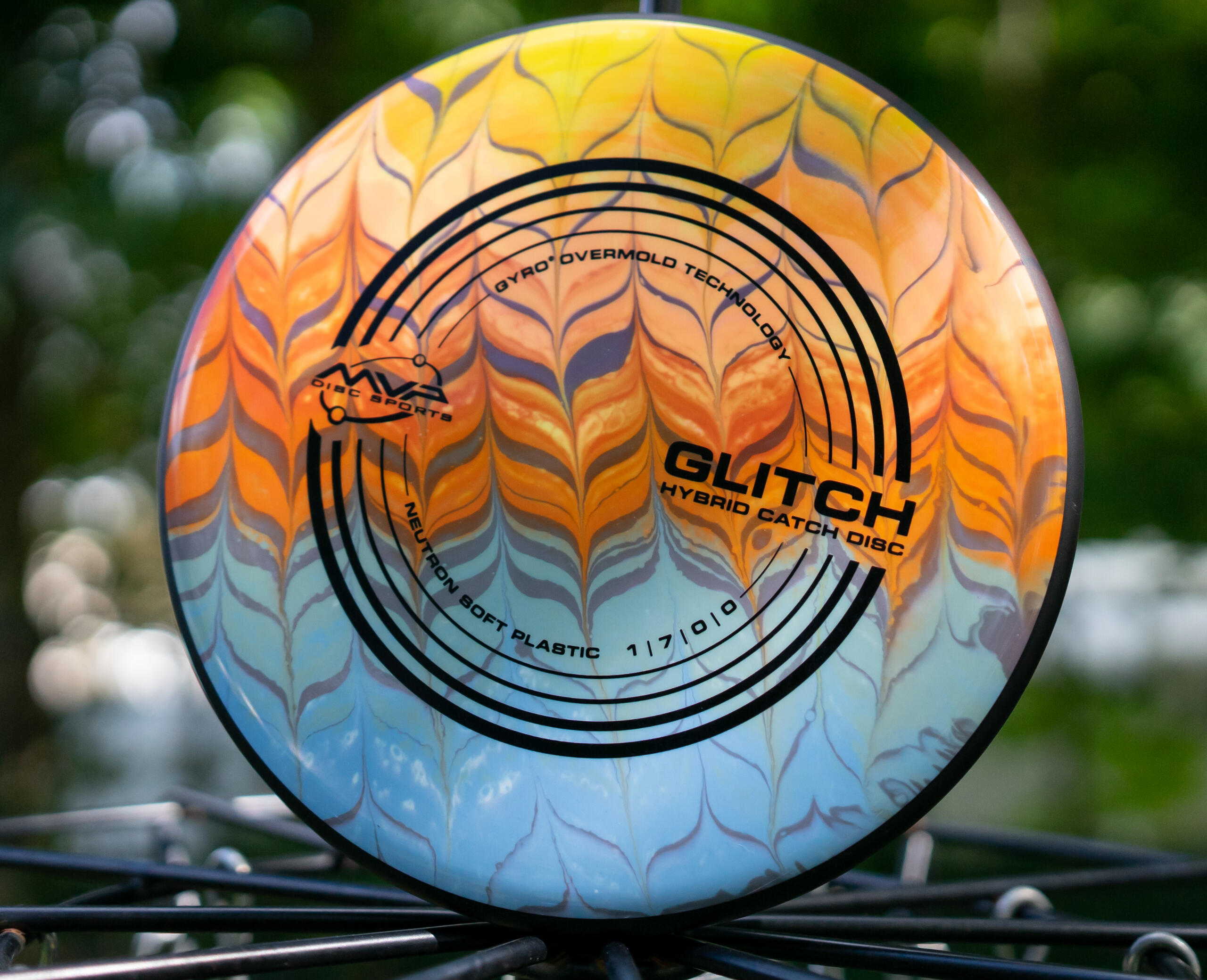 MVP Glitch – Blue & Orange Feather