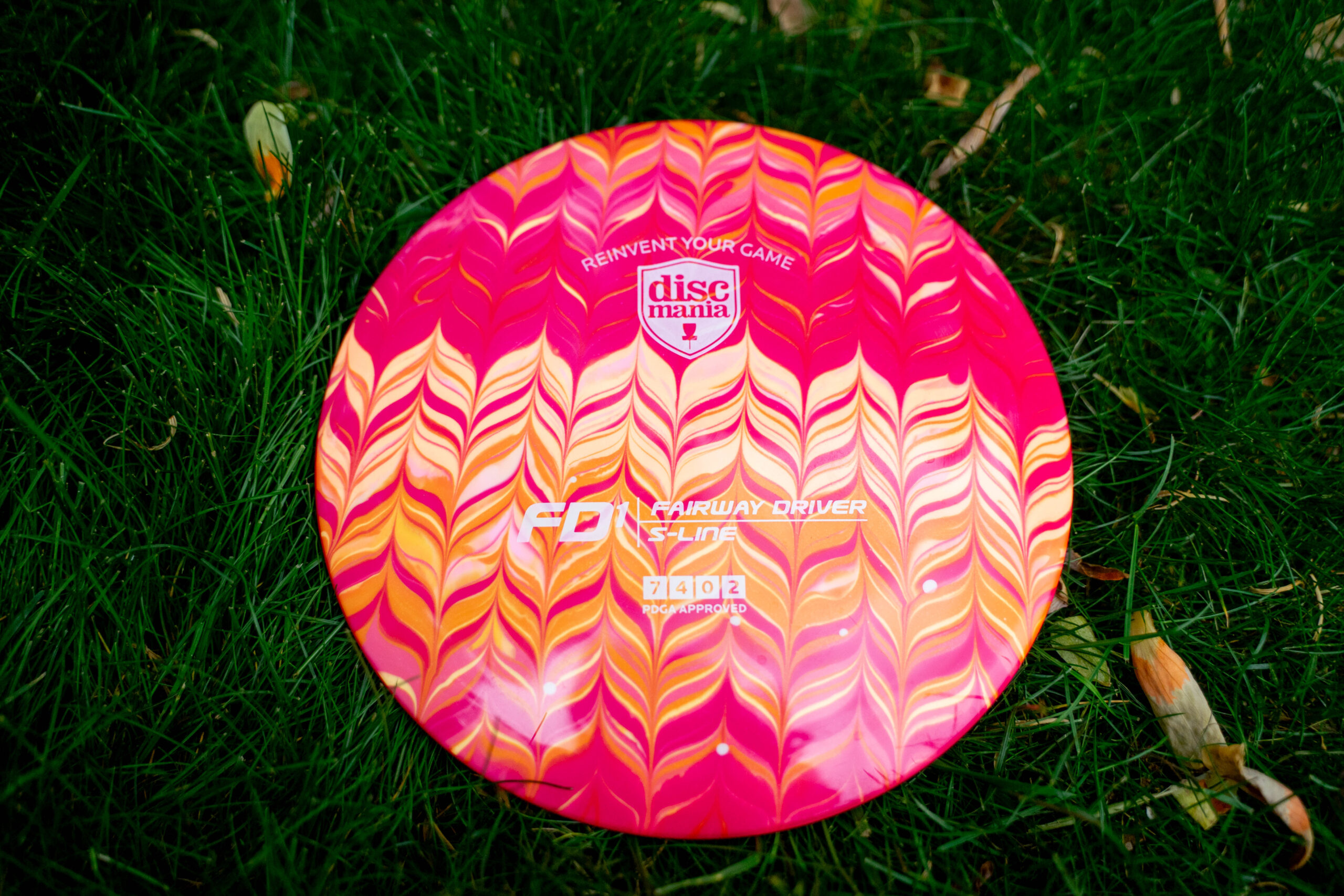 Discmania S-Line FD1 – Pink, Red, and Orange Feather Dye