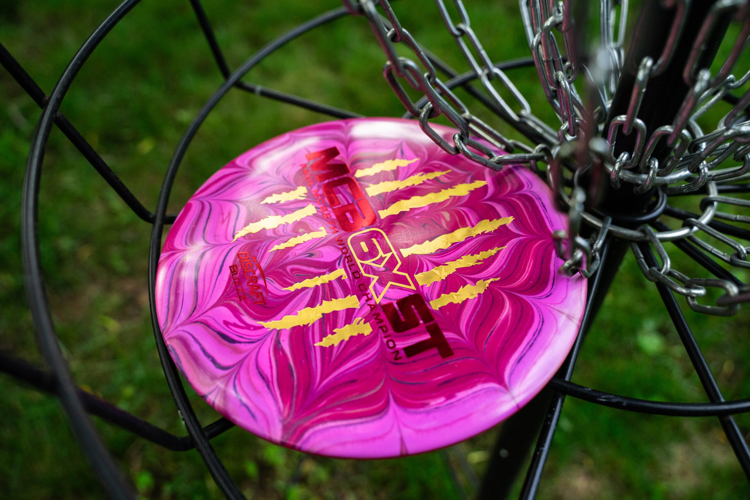 Discraft ESP Buzzz (Paul McBeth Edition) – Red, Pink, & Purple Flower Dye