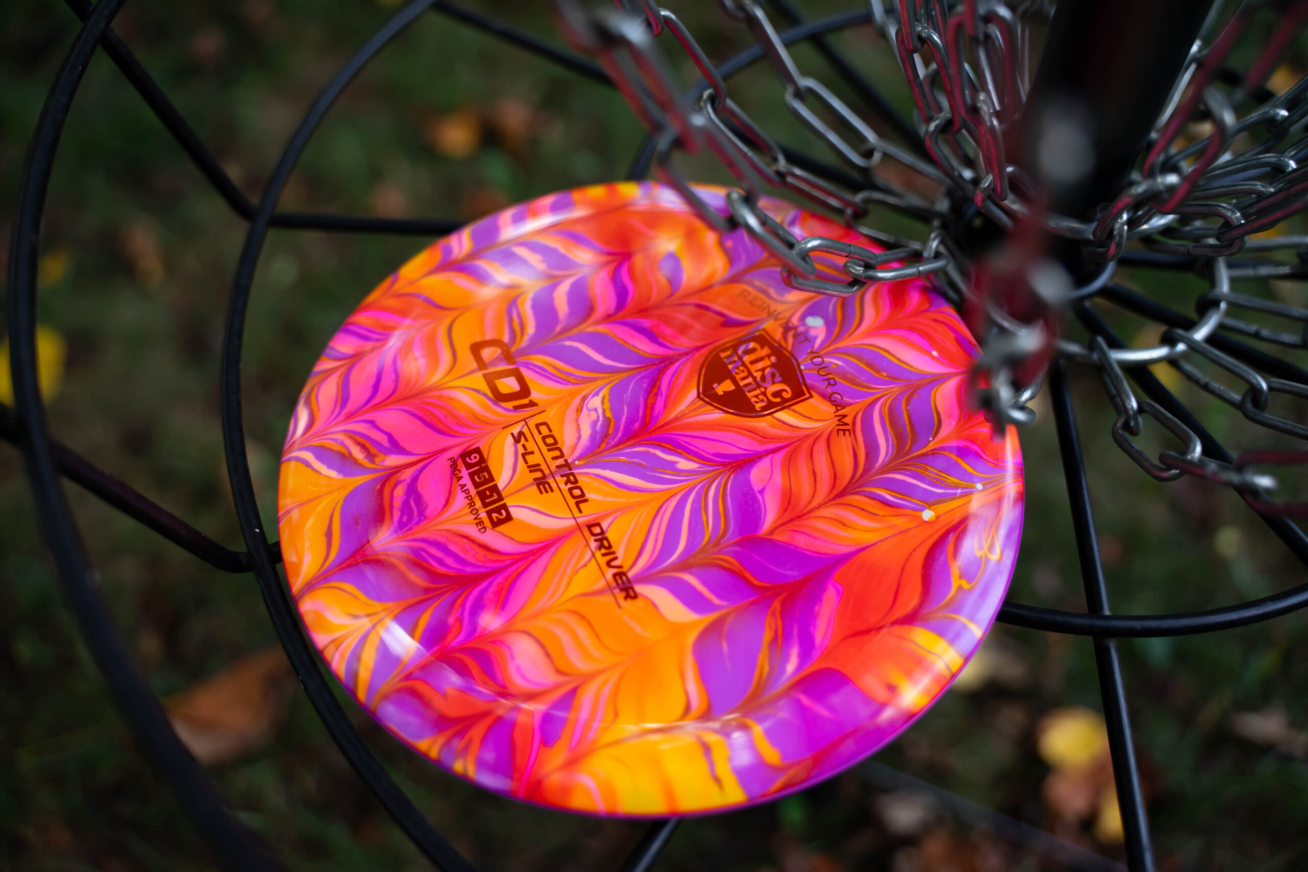 Discmania S-Line CD1 – Orange, Purple, and Pink Feather Dye